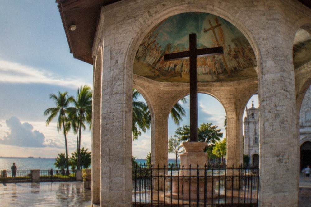 A calm evening street scene outside a heritage church in Cebu City