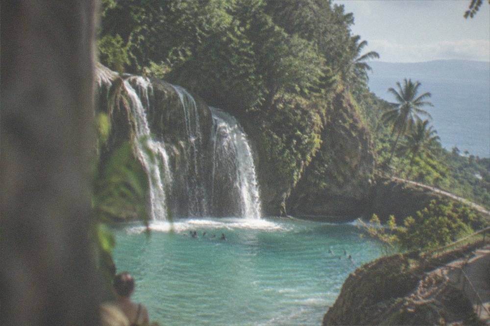 Coastal road with views over the Tañon Strait toward the mountains of southern Cebu