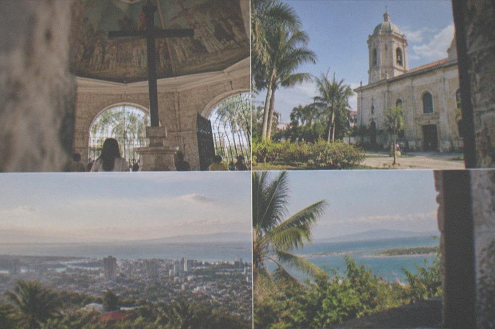 A panoramic view over Cebu City and the Mactan Channel from a highlands ridge at golden hour