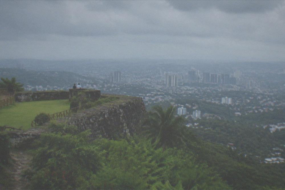 Old triangular stone fort with grassy lawns in a tropical city centre