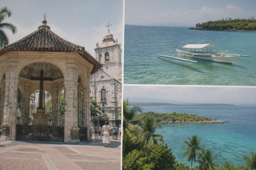An outrigger boat moored in shallow turquoise water beside a marine sanctuary island off Mactan, Cebu