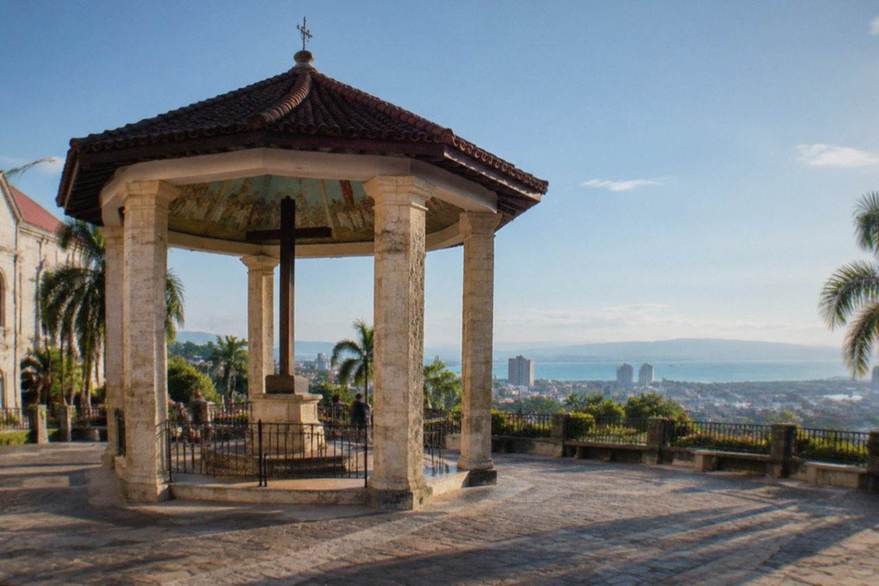 View over Cebu City skyline with the sea and hills in the background on a clear morning