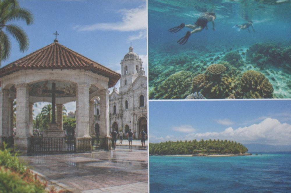 Snorkelers swimming over a coral reef in clear water near a tropical island in Cebu