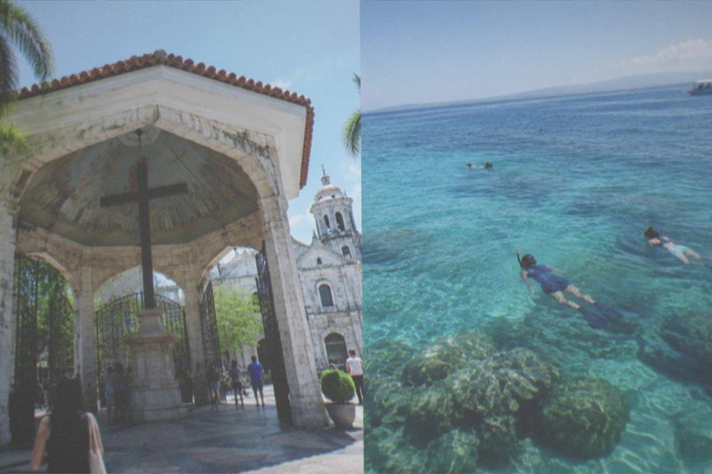 Snorkelers in clear shallow water above a coral reef near a Cebu marine sanctuary