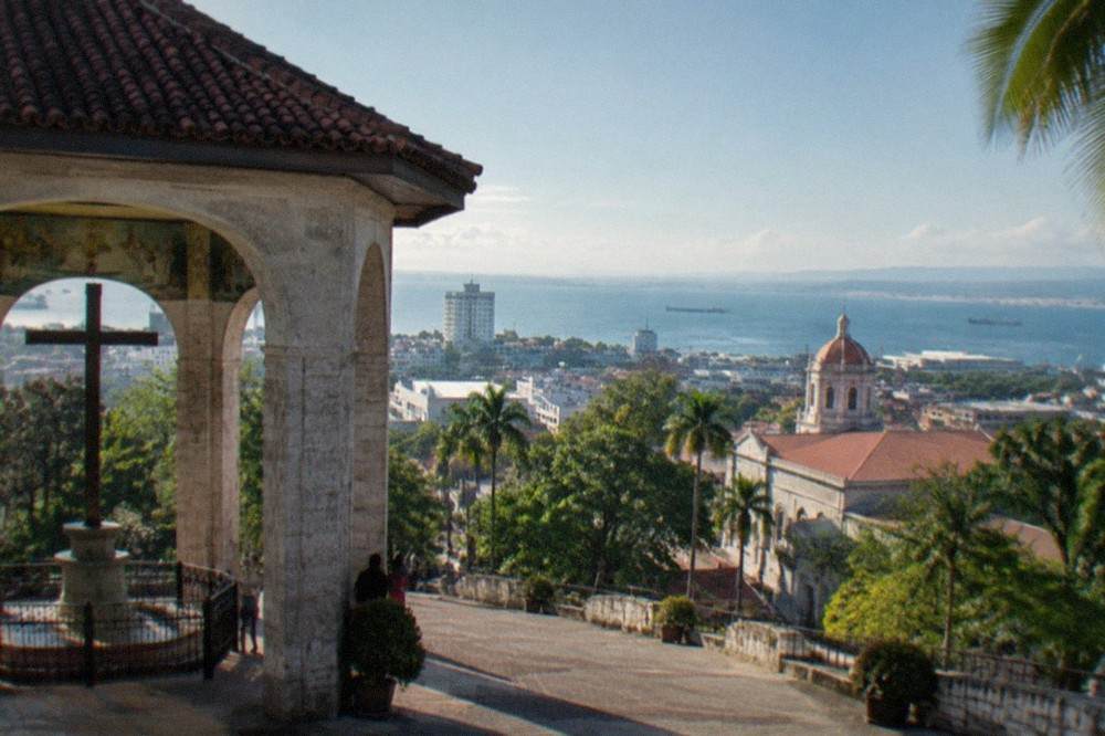 Aerial view of Cebu City's downtown buildings and church domes in the morning